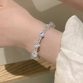 Elegante bracciale in argento con zirconi a taglio quadrato e castone a griffe - Argento (Zircone Quadrato)