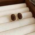Close-up of gold-plated earrings with dark brown velvet texture in a jewelry box - Oval Style (HE29253) / Brown