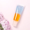 Detail of clear squeeze tube showing dual-layered blue and orange glossy lip gel - No.01 / 10ml Bottle Unpackaged (excluding Cardboard Box)