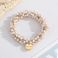 Élastique à cheveux fait main avec cristaux roses, perles blanches et pendentif doré - Style Perle en Cristal Rose