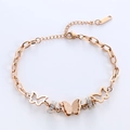 Bracciale a farfalla traforata in oro rosa con strass e catena a maglie sottili - Oro rosa