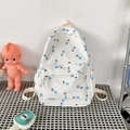 Zaino in nylon bianco con motivi di tulipani blu per ragazze in ambiente scolastico - Tulipano Blu