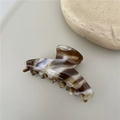 Medium acetate hair claw clip with brown and white marble tortoiseshell pattern for women - Coffee Crescent