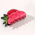 Chic strawberry-shaped claw clip in bright magenta finish for elegant ponytails - Strawberry
