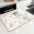 Tappetino scolapiatti assorbente con motivi floreali su superficie in pelle crema - 50x60cm / Arancione Camelia