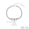 Detailed view of silver titanium steel snake chain bracelet with crystal charms and size info - Round Pendant / Silver