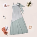Detail of sage green satin midi dress with bow shoulder and chic ruffle neckline - S / Light Green