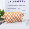 Knitted checkerboard makeup bag in orange and white with a secure yellow zipper - Large Yellow-White Grid