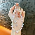 Elegant heart beaded phone strap with iridescent crystals and pearls for bag charms - Pink