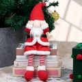 Rode gebreide kerstkabouter met lange benen, pluche ornament zittend op boeken - Rood & Wit Kerstkabouter met Lange Benen (Gezicht Bedekkend)