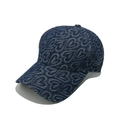 Detail shot of navy denim baseball cap featuring embossed heart patterns and textured fabric - M (56-58cm) / Navy Blue