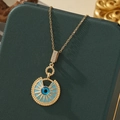 Collier avec pendentif œil protecteur en acier titane doré, émail bleu et zircons - A21-or