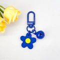 Simpatico portachiavi a fiore blu con campanellino e moschettone per borse e chiavi - Blu scuro
