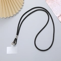 Close-up of black rhinestone crossbody phone strap with silver ring and secure gasket - Black