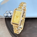 Orologio rettangolare dorato da donna con castone di diamanti e cinturino a catena spessa - Oro