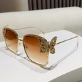 Schicke Schmetterling-Metallsonnenbrille mit Goldrahmen und braunem Farbverlauf - Verlauf Tee