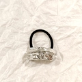 Minimalist elastic hair tie with textured silver alloy hollow ornament on white paper - Silver Brushed Liquid 5cm