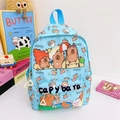Light blue kids backpack featuring cute capybara prints and large storage capacity - Blue