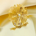 Macro shot of 3D layered golden flower ring with central pearl on silk background - Adjustable Open / Layered Hollow Pearl Flower Style (KR113267-SP)