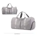 Large grey gym duffle bag with water-resistant fabric and multi-pocket design - Standard Grey