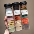 Three-pack of vibrant woven elastic hair bands in transparent jars for ponytail styling - Macaron + Forest + Autumn (300 Pcs/Can)