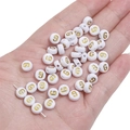 White and gold acrylic flat round bead featuring the letter G for DIY jewelry - Letter G