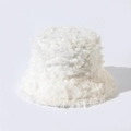 Detailed view of the soft white fluffy plush texture on a cozy winter bucket hat - White