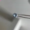 Titanium steel stud earring with brilliant round cut grey-blue sparkling cubic zirconia - 6mm Light Blue (Single Piece)