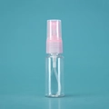 Compact travel refillable mist spray bottle in clear plastic with a pink nozzle - 20ml / Transparent Bottle Pink Spray