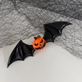 Halloween bat wing hair clip with orange pumpkin lantern detail on white background - Pumpkin Black