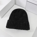 Classic black knitted slouchy beanie for women in warm ribbed winter material - One Size / Black