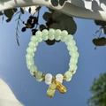 Light green beaded bracelet with a golden peanut charm reflecting blue sky in a mirror - S063-imitation Natural Green Agate Peanut Bracelet #sz516