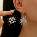 Silver 18k gold-plated stainless steel sunflower spiral drop earrings on a model - Steel Color Stainless Steel Sun Earrings