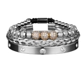 Close-up of a three-piece jewelry set featuring silver mesh and gold crystal-set bracelets - Steel + Gold Set