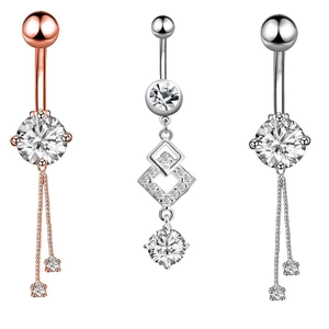Elegant belly button rings with rose gold and silver finish featuring cubic zirconia stones