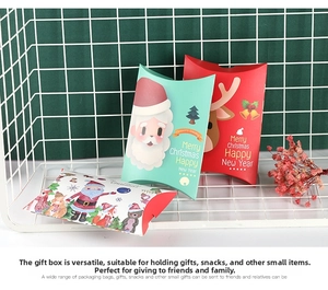 Christmas pillow gift boxes featuring festive elk, Santa, and snowflake printed patterns