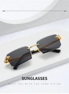 Macro shot of gold leopard head detail on rimless gradient lens sunglasses