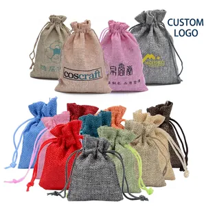 Close-up of multicolored jute drawstring bags showing textured fabric and dual ropes