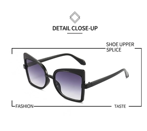 Detail close-up of cat-eye sunglasses with black frames and gradient purple lenses