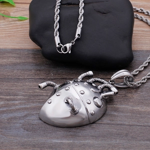 Mechanical punk heart pendant in stainless steel with silver finish and rope chain style