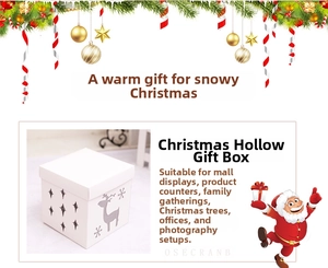 Detail of white Christmas gift box with cutout stars, grey deer and snowflake patterns