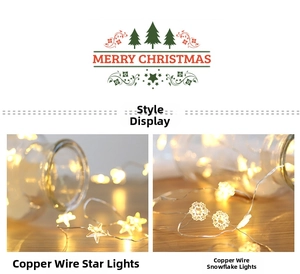 Close-up of decorative warm LED star and snowflake copper wire string lights in glass jars