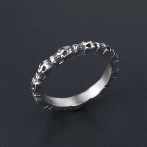 Titanium steel silver skull ring for men and women with repetitive engraved patterns