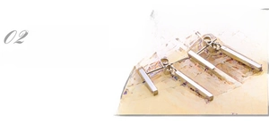 Detail of mirror-polished silver rectangular bar stud earrings in stainless steel