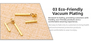 Detail of vacuum plated long bar earrings showing eco-friendly plating and gold finish