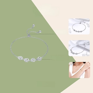 Detail of S925 sterling silver adjustable paw bracelet with white gold plating and 22cm chain