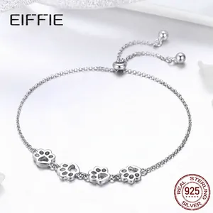 S925 sterling silver bracelet with four cutout paw prints and adjustable slider buckle