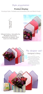 Detailed view of colorful folding envelope flower boxes in striped and polka dot patterns