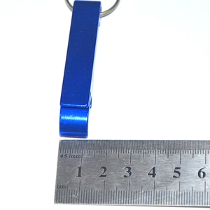 Blue aluminum tiger-shaped keychain bottle opener shown with ruler for 6.5cm size