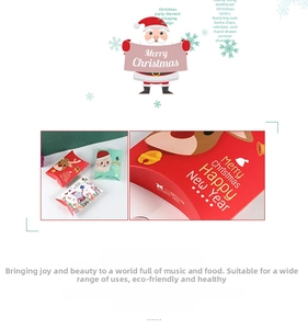 Close-up of Christmas pillow boxes with cartoon Santa and reindeer patterns